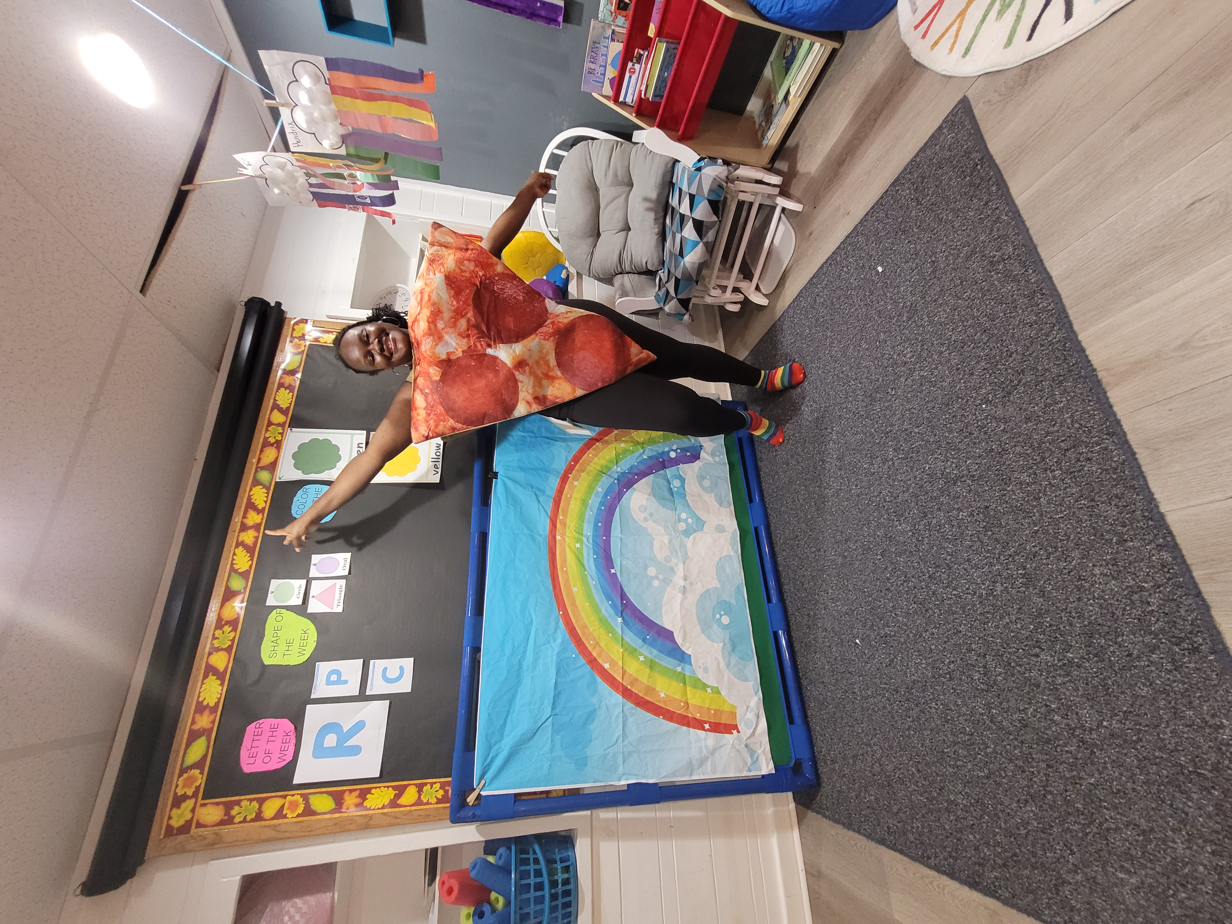 Child painting at easel